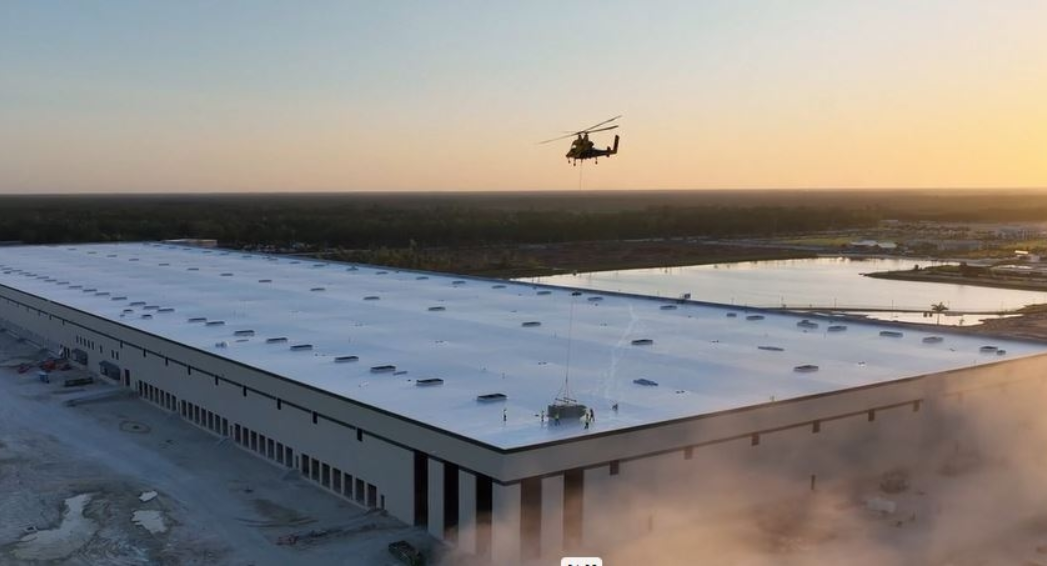 HVAC installation via helicopter at Uline Distribution Center in Naples by Crowther Roofing and Cooling