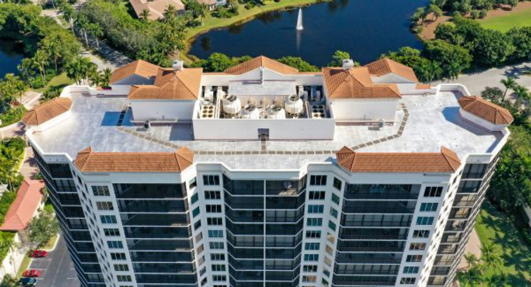 Crowther-Roofing-and-Cooling-does-a-roof-coating-on-Florencia-Condo-in-Bonita-Springs