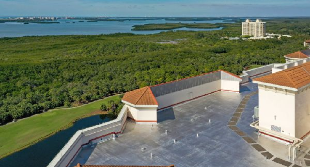 Roof coatings by Crowther Roofing and Cooling at Florencia Condos in Bonita Springs