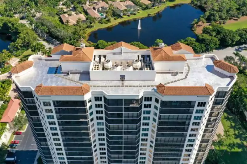 Crowther-Roofing-and-Cooling-does-a-roof-coating-on-Florencia-Condo-in-Bonita-Springs